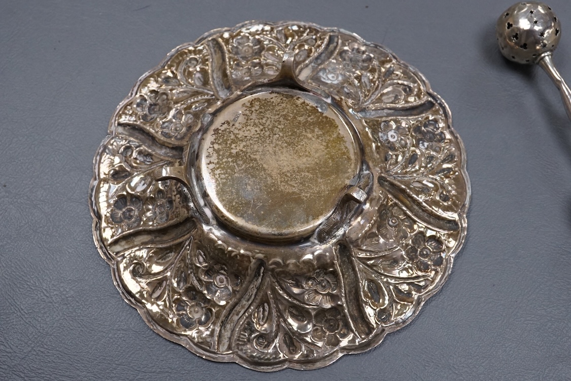 An Edwardian silver child's rattles, of dumbbell form, Crisford & Norris, Birmingham, 1906, 11cm, together with a 20th century Egyptian 900 standard white metal dish, post 1946 mark,(lead solder).